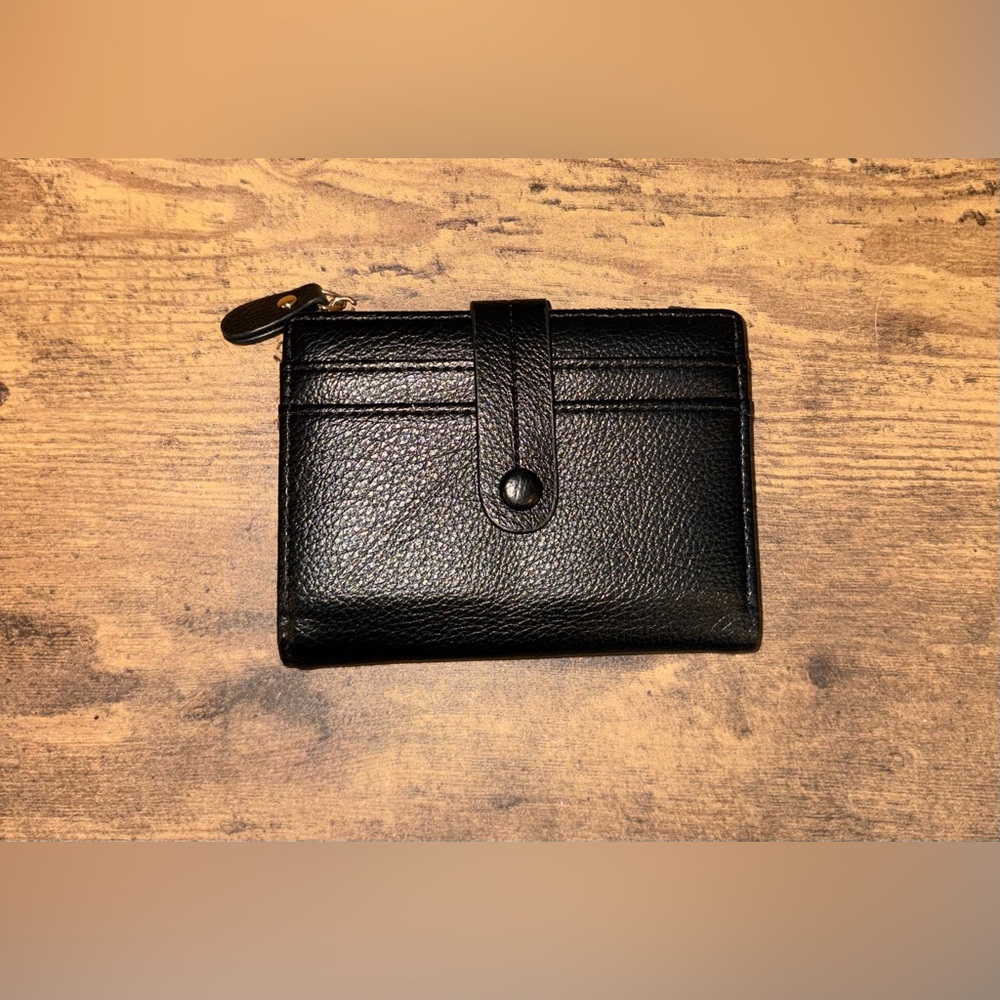 NWOT Woman’s Black Leather Bi-fold Wallet